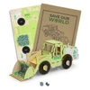 A wooden model of a wheel loader in light green, accompanied by cardboard sheets for assembly and instructions.