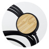 A charging cable featuring three connectors with a black design and a round bamboo accent.