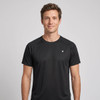 A black T-shirt featuring a logo, displayed on a male model against a plain background.