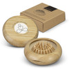 A bamboo brush and mirror set in a round case, accompanied by a brown outer box with a logo.