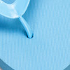 A close-up of a light blue Tidal Flip Flop with a thong strap and textured footbed. Features a logo.