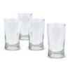 Four clear glass tumblers with a sturdy base, arranged closely together on a white background.