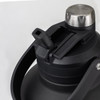 A drink bottle in black with a stainless steel cap and a detachable spout, featuring a sturdy handle and branding.
