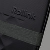 A close-up of a black suitcase featuring a textured surface and an attached dark green strap. It has a logo visible.