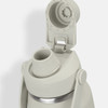 A drink bottle in light grey with a screw-on lid and spout, featuring a logo on the body.