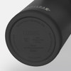 A drink bottle in sleek black stainless steel featuring a base with branding. Ideal for maintaining beverage temperature.