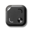 A black Bluetooth tracker featuring a metal button and a small opening, with a minimalist design.