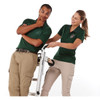 Two models wear green short sleeve polo shirts, posing with a ladder, showcasing the shirts' fit and style.