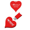 A red heart-shaped USB flash drive with a removable top and a logo on one side.