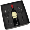 A wine box featuring a red wine bottle and two clear wine glasses, all in a black cushioned packaging.