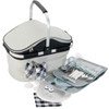 A grey and black picnic carry bag with cutlery, plates, glasses, napkins, and salt and pepper shakers arranged beside it.