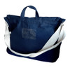 A navy canvas shoulder bag with a white strap and a small logo on the front.