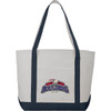 A large, premium heavy weight cotton boat tote in white with navy handles and a logo on the front.