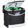 A black and white cooler bag containing several green cans. The bag features a logo and an open lid.