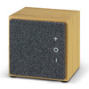 A bamboo Bluetooth speaker with a grey felt front, featuring simple volume controls and a modern cube design.