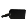A black luggage tag with a leather finish and a strap for attachment. It has a minimalistic design.