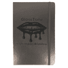 A black journal with an elastic band and a logo on the cover, featuring a glossy finish.