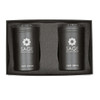 A gift box containing two black tumblers with a logo, placed in a protective foam insert.