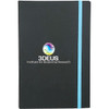A black journal with a blue elastic band and a circular logo on the front cover.