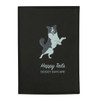 A black refillable journal with a design featuring a jumping dog and text for "Happy Tails Doggy Daycare."