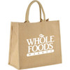A large jute tote bag in a natural brown colour featuring a logo on the front. It has two sturdy handles.