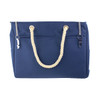 Navy waterproof beach bag with a rope handle and silver clasps, featuring two external pockets.