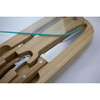 A bamboo knife set featuring two stainless steel knives, housed in a wooden case with a glass top and a teal accent.