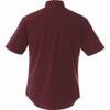 A short-sleeve men's button-up shirt in burgundy with a rear view and a logo present.