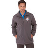 A men's softshell jacket in grey, featuring a front zipper and a logo on the upper left side.