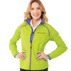 A woman wearing a bright lime green packable rain jacket with a blue collar and a logo on the chest.
