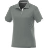 A women's short sleeve polo shirt in a soft green hue, featuring a subtle texture and a branded logo.