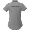 A grey women's polo shirt with short sleeves and a back panel detail. It features a branding logo.