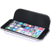 A black and white wireless charger featuring a slot for holding a smartphone while charging.