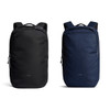 A black and a navy blue Bellroy Via Backpack 20L displayed side by side, featuring a logo and a sleek design.
