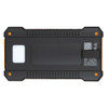 A solar power bank in black and orange, featuring a textured surface and a logo.
