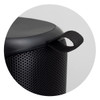 A black Bluetooth speaker featuring a textured surface and a carry strap. The design is compact and cylindrical.