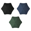 A collection of three BLUNT Sport Umbrellas in black, navy, and green, displaying their unique hexagonal shapes.