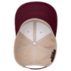 A maroon and beige 6-panel mid-profile baseball cap with a curved brim and an interior lining.