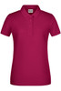 A ladies polo shirt in a vibrant magenta colour with a classic collar and three-button placket. It features a logo.
