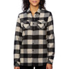 A long sleeve, black and cream check flannel shirt with two chest pockets and a button-up front. It has a logo visible.
