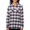 A long sleeve, yarn-dyed flannel shirt in a red, white, and blue plaid pattern with two chest pockets and a button-up design.