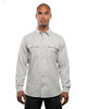 A light grey long sleeve yarn-dyed flannel shirt with button-up front and two chest pockets. It features a logo.