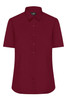 A burgundy button-up shirt featuring short sleeves and a collar, with a logo on the chest.