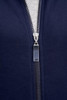A navy men's jacket featuring a front zipper and a grey inner layer. The jacket has a logo on the zipper.