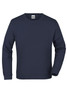 A navy blue crew neck jumper with long sleeves and a logo on the label.