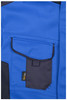 A blue softshell jacket featuring a contrasting dark pocket and a logo on the pocket.