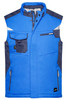 A blue softshell vest with navy accents, featuring multiple pockets and a branded logo.