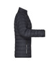 A puffer jacket in dark grey featuring a zippered pocket and a stand-up collar. It has a sleek design and a logo.