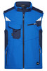 A blue softshell vest featuring multiple pockets and contrasting navy sections, with a logo on it.