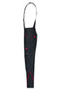 Workwear pants with bib in black, featuring red accents and multiple pockets. Includes adjustable straps and a logo.